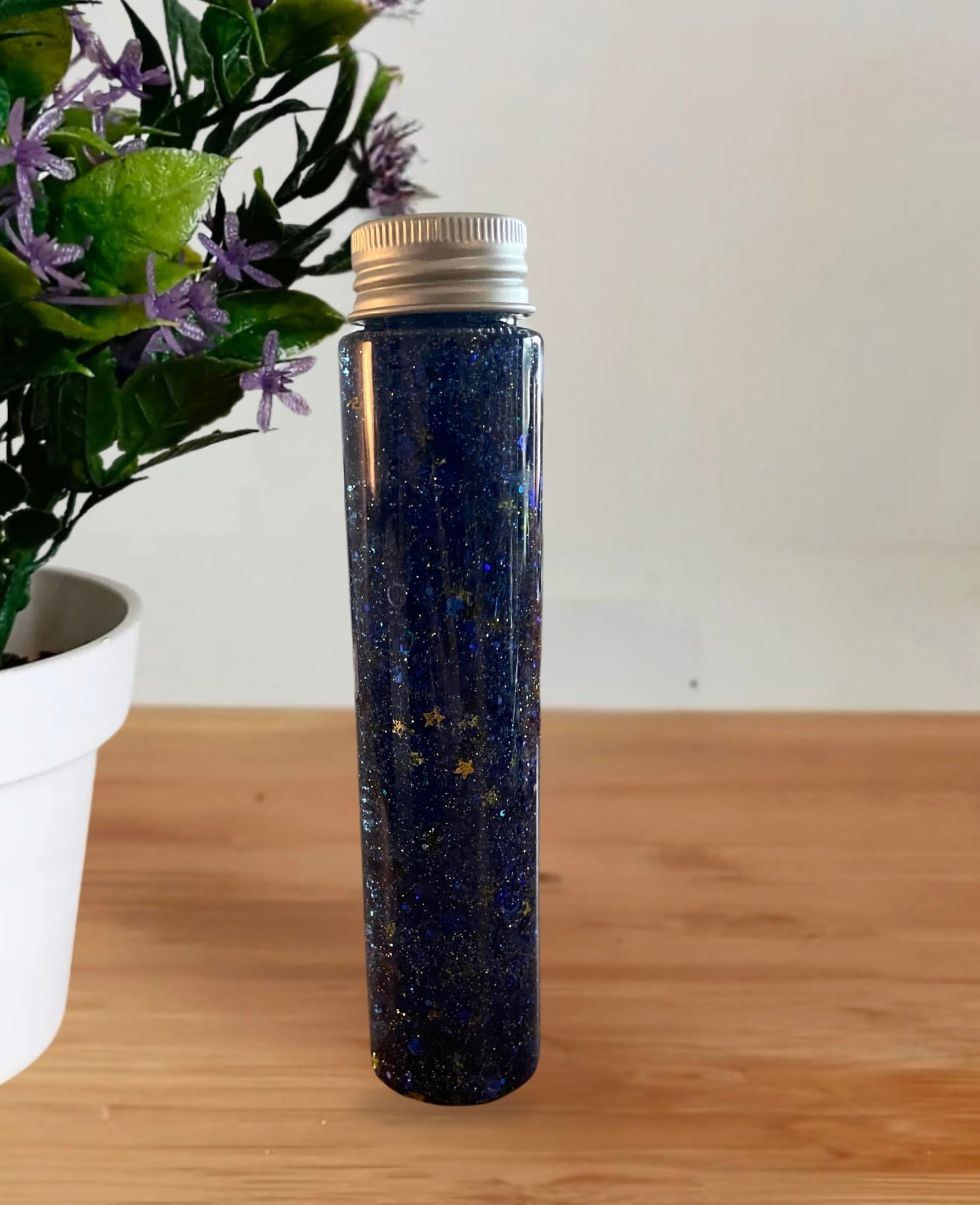 Bouteille sensorielle à sequins bleu